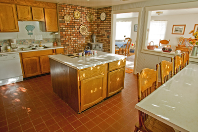 Equally spacious kitchen with the required amenities. 